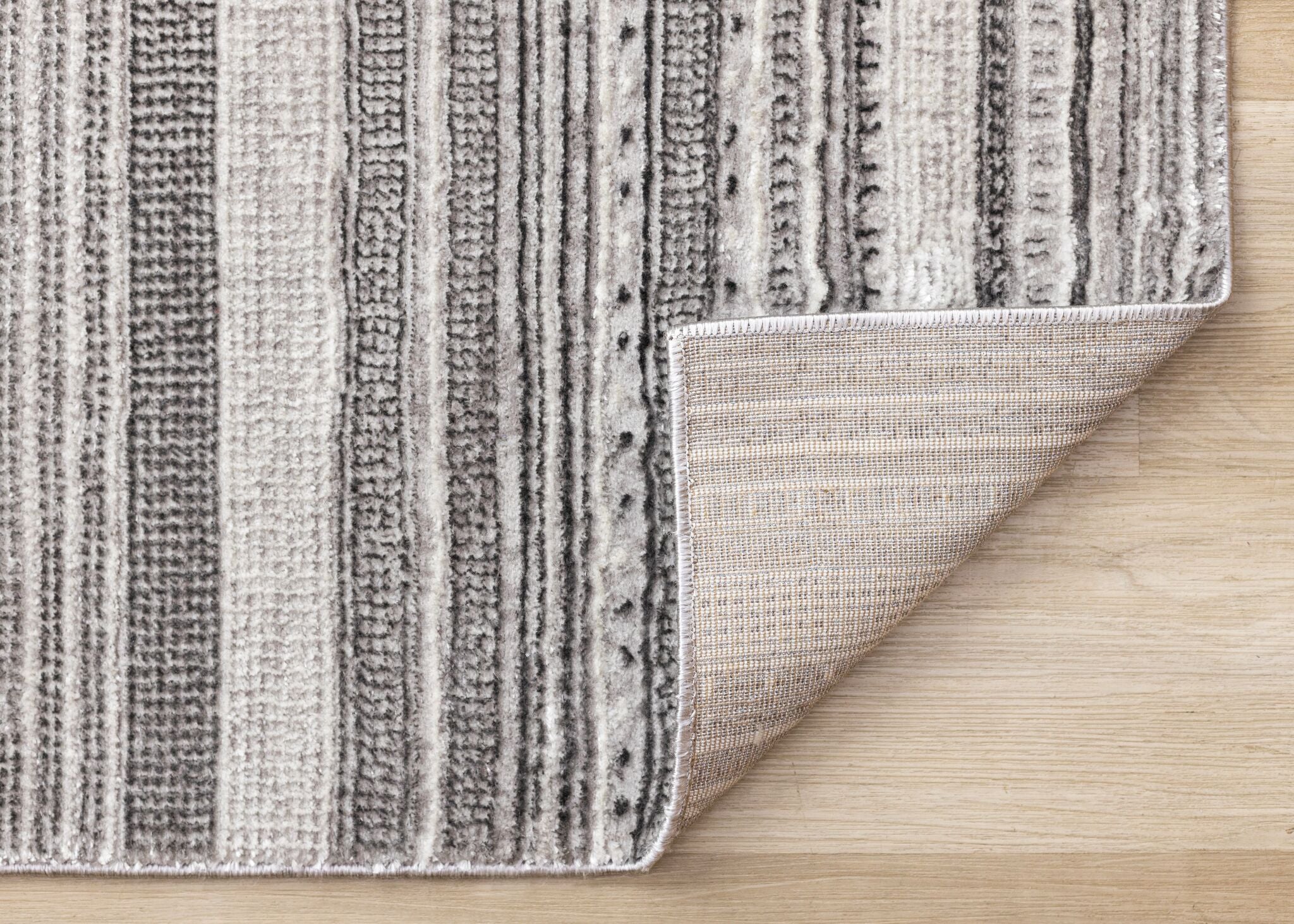 Zola 6'7" x 9'6" Patterned Rows Area Rug - Grey, White, Black - Image 2
